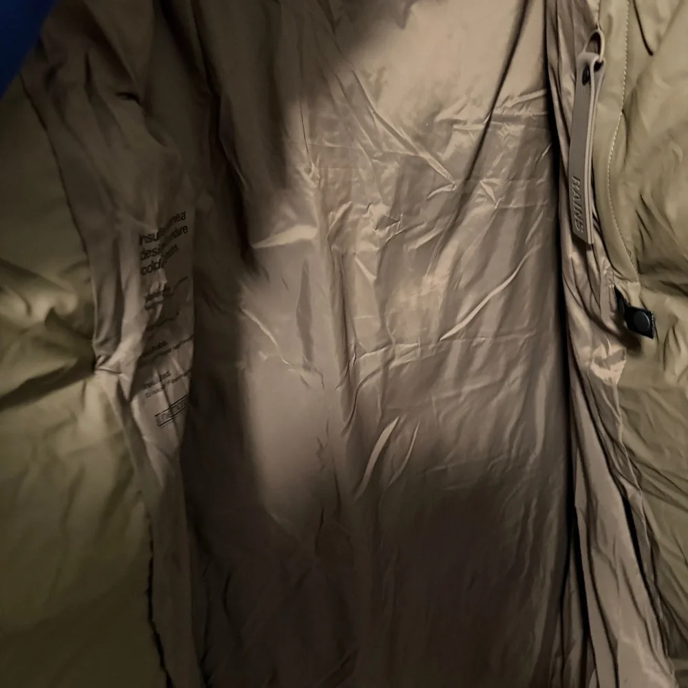 Rains Long Puffer Coat in Brown - Picture 9 of 16